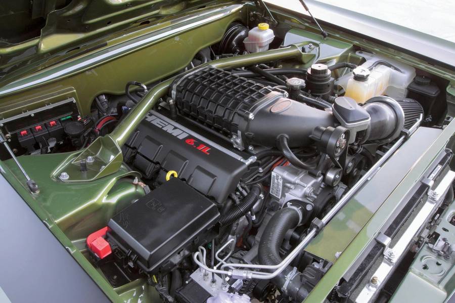 Attached picture modified-engine-bay-of-a-1969-plymouth-road-runner-color-6-1l-hemi.jpg