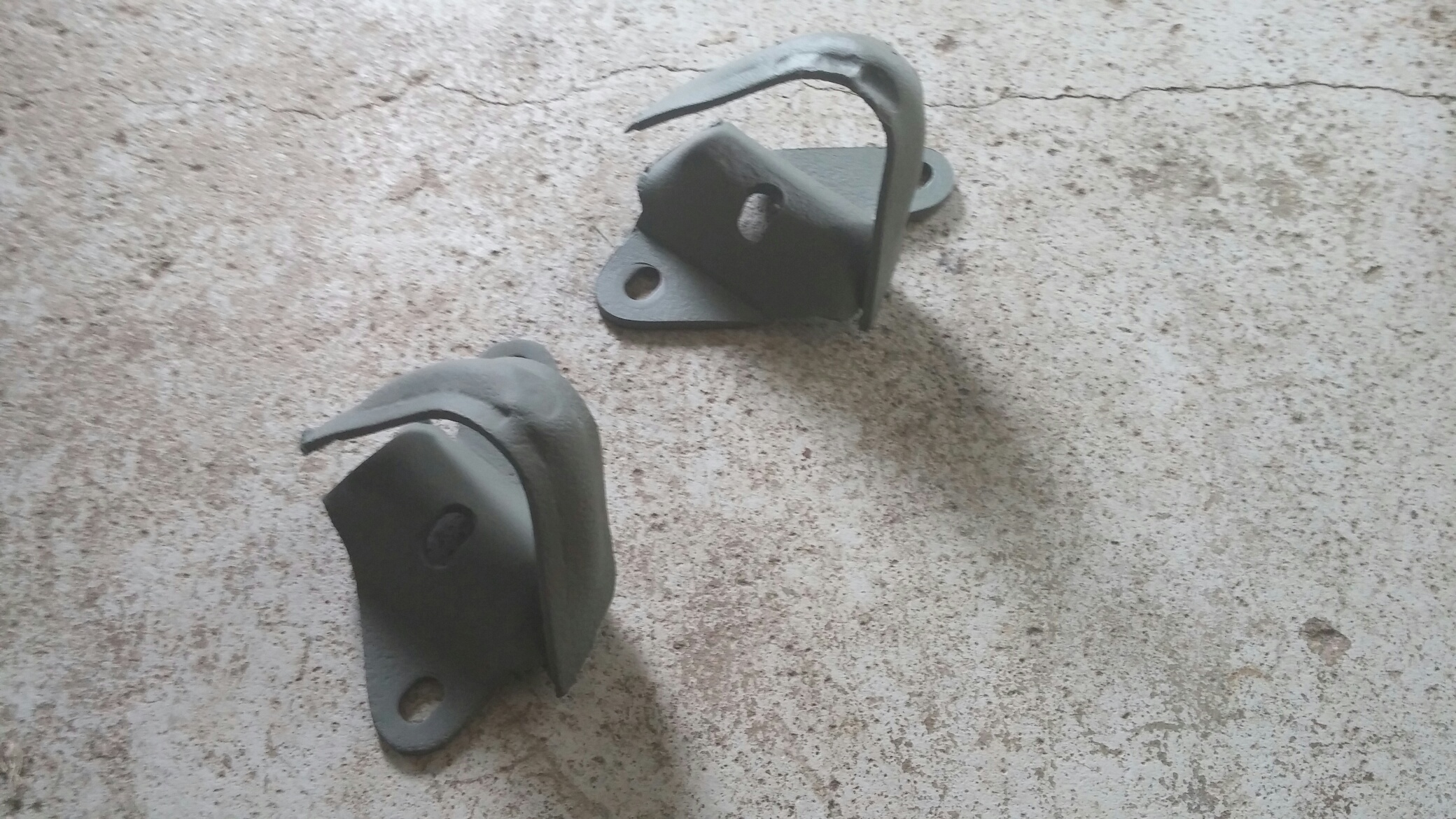 Attached picture swaybarbushingbrackets.jpg