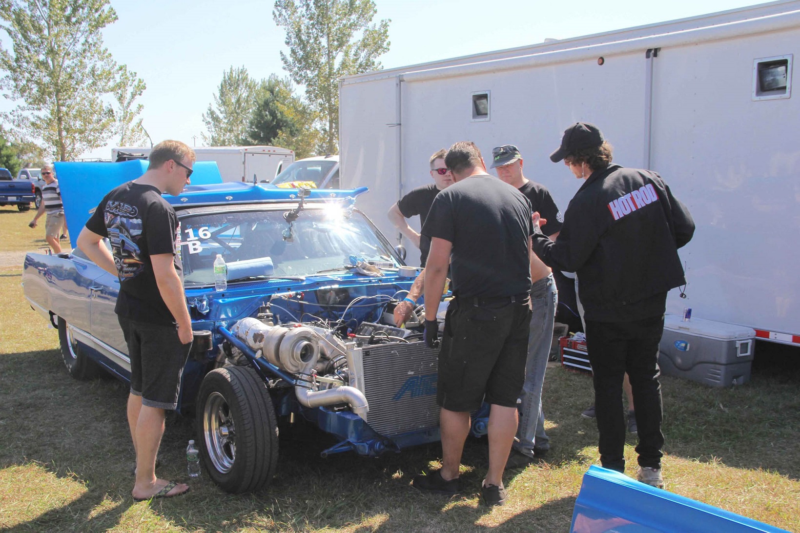 Attached picture 234-2017_Drag_Week_Wrenching_Engines_Working.jpg