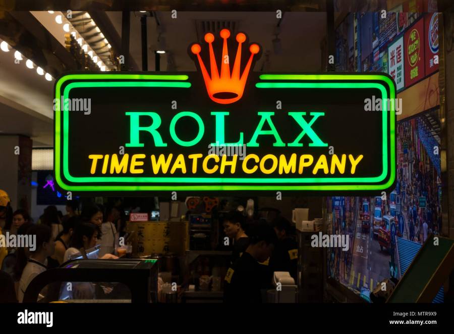 Attached picture fake-or-counterfeit-goods-and-products-sold-in-china-store-sign-with-rolex-misspelled-MTR9X9.jpg