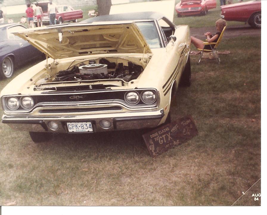 Attached picture 6158279-MoparNationals19841970GTXyellow.jpg