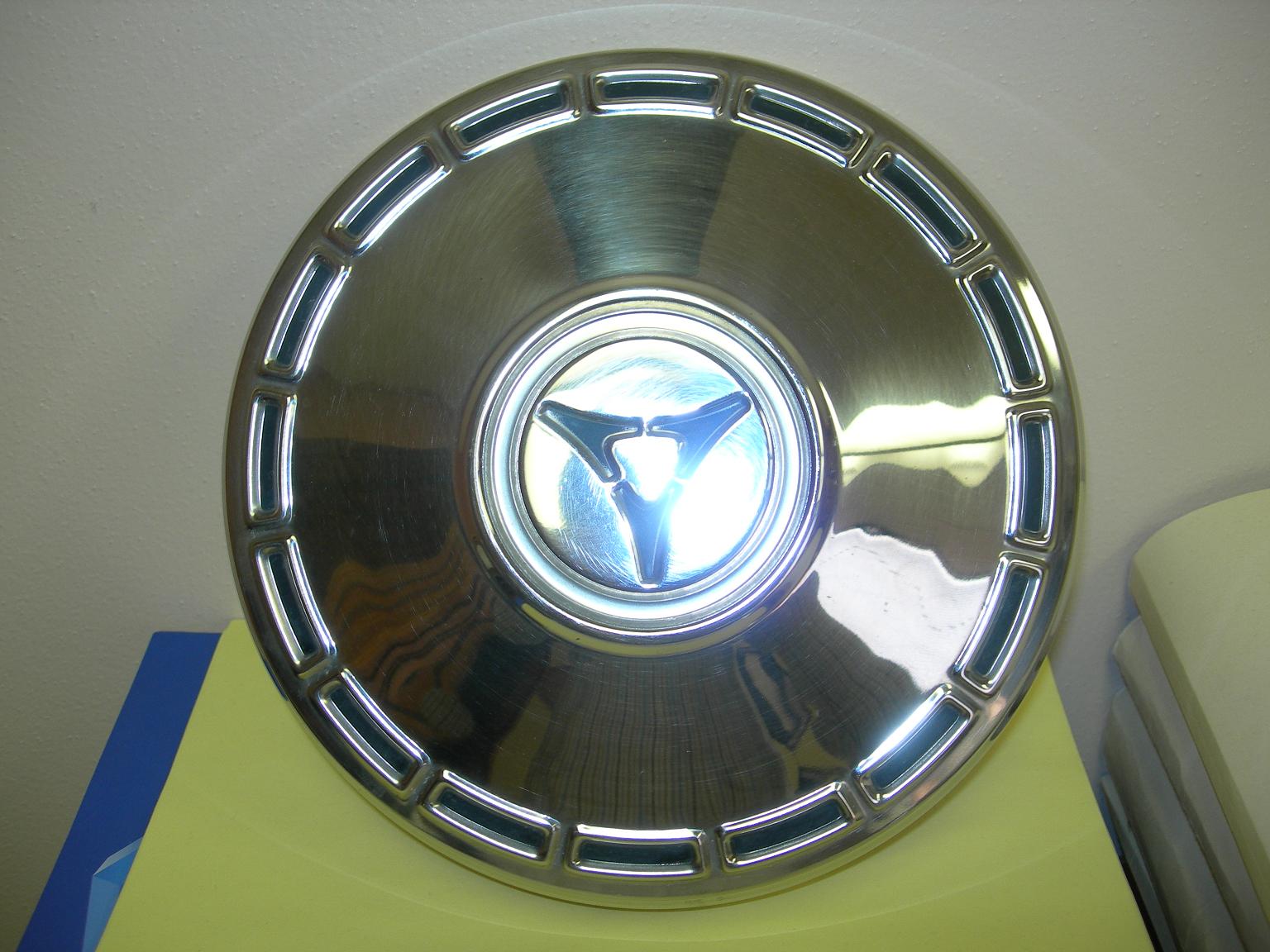 Attached picture 6438318-Hubcaps002small.JPG