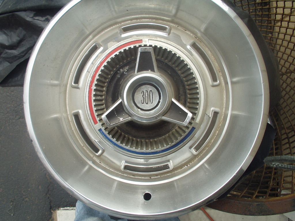 Attached picture 7160970-300hubcap001.JPG
