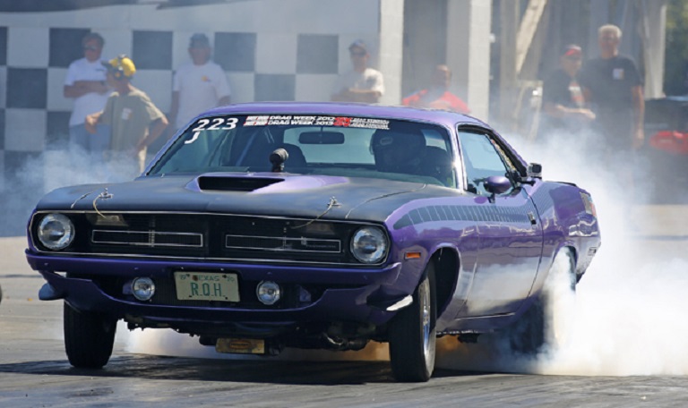 Attached picture 7950316-1970-plymouth-cuda-aar-plum-crazy-drag-week-2013-action-002.jpg